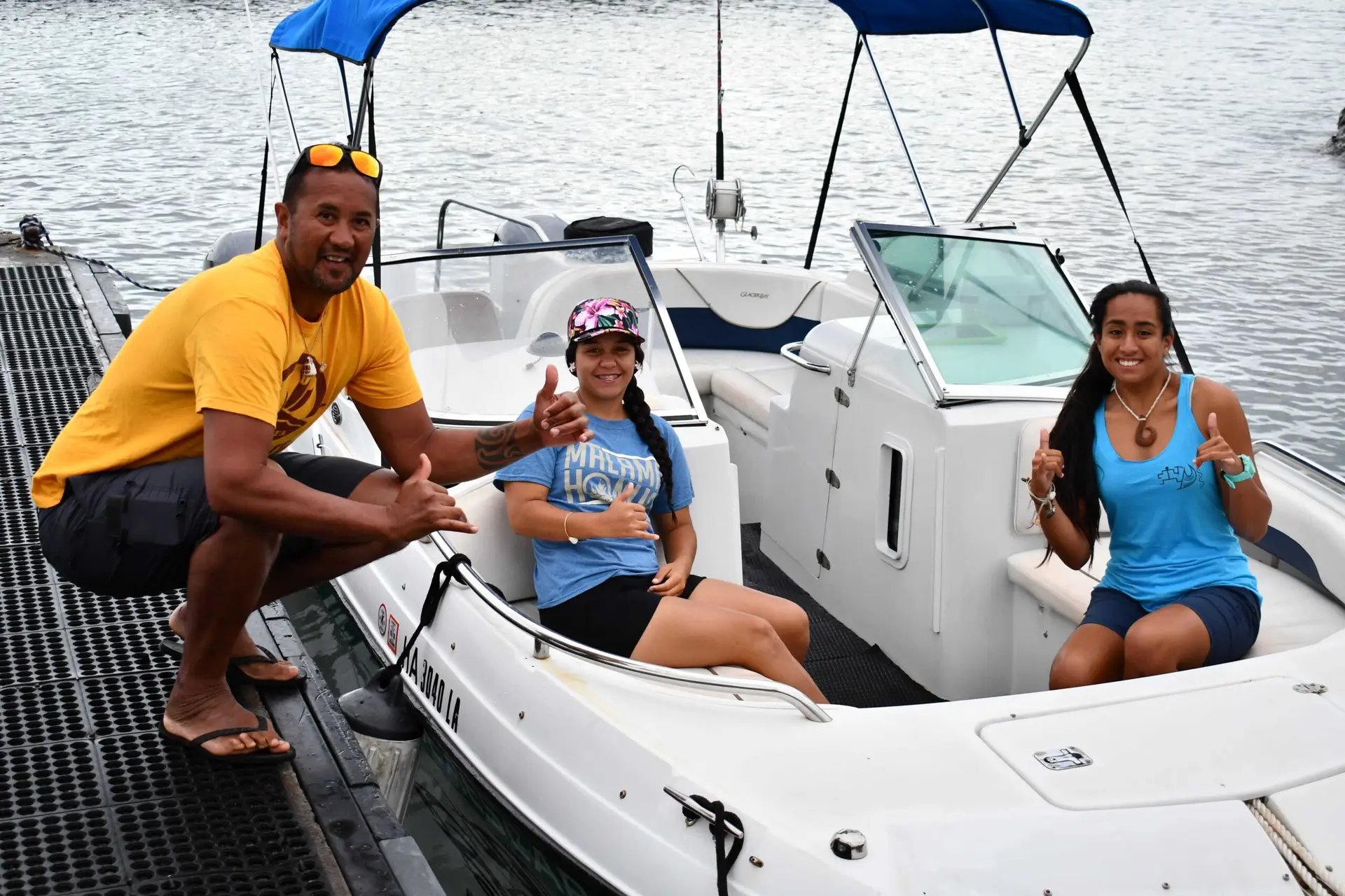 Guests with a Glacier Bay boat at the Maui dock